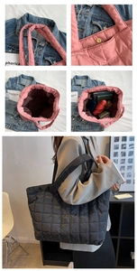 Detail view of large quilted puffer tote bag with magnetic clasp and spacious interior