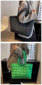 Close-up of quilted pattern and texture on black and green nylon tote bags