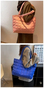 Quilted tote bag detail showing pink and blue puffer shoulder bags in daily casual style