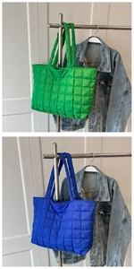 Quilted puffer tote bags in bright green and royal blue with square stitching detail