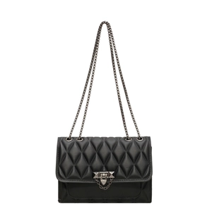 Classic black quilted crossbody bag with gunmetal chain strap and geometric metal lock