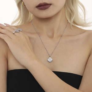 Silver Evil Eye square pendant necklace and ring set with blue center stone and crystals