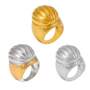 Vintage chunky textured oval rings in gold, silver, and two-tone finishes on white background