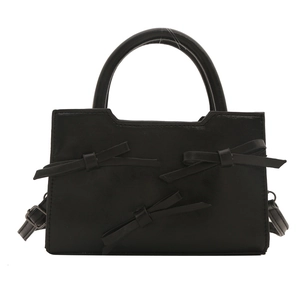 Sac à main noir élégant avec nœuds décoratifs et bandoulière réglable pour femmes