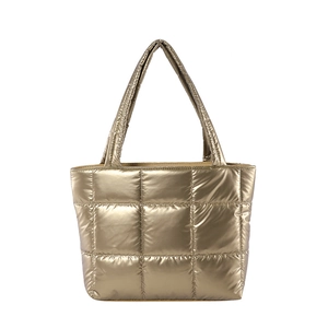 Minimalist golden quilted puffer tote bag with large square stitching and shoulder straps