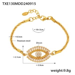 Detail view of gold-tone titanium steel evil eye bracelet with zircon and size dimensions