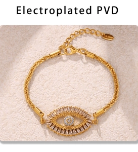 Detailed shot of PVD gold Evil Eye bracelet with cubic zirconia and S.steel logo