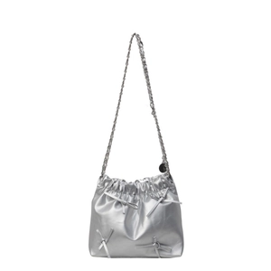 Silver metallic drawstring bucket bag with ribbon bows and chain shoulder strap