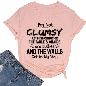 Pink crew neck t-shirt with black humor slogan and stylish side knot hem detail