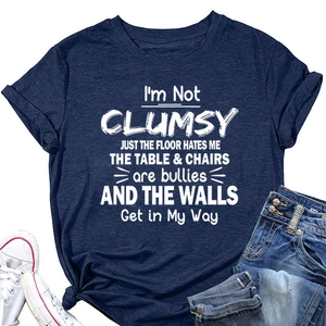 Navy crewneck T-shirt with vintage white lettering text paired with denim shorts