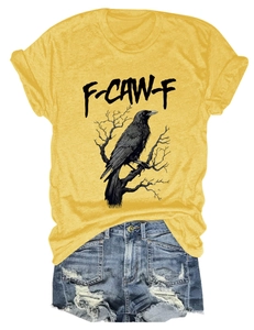 Detail of eagle graphic print on yellow T-shirt paired with denim shorts set