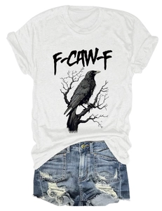 Detail of white cotton t-shirt with eagle print and blue distressed denim shorts set