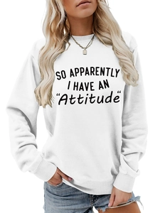 Detail of white crewneck sweatshirt with black 'Attitude' typography and ribbed cuffs