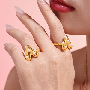 Chic PVD gold plated stainless steel rings with abstract design and faux pearls