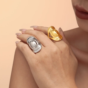 Exaggerated oval straw hat style open rings in polished gold and silver steel