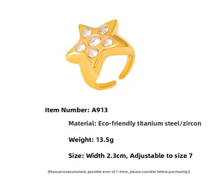 Detalle del anillo estrella de oro con circonitas mostrando dimensiones y acero de titanio
