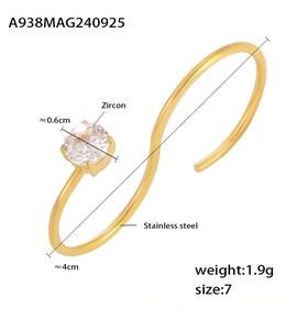 Détails de la bague en S en acier inoxydable avec zircon de 0,6 cm et finition dorée