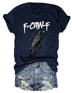 Flat lay of navy eagle print t-shirt paired with ripped denim shorts set for women
