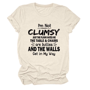 Detail of soft cotton beige T-shirt showing high-quality fabric texture and slogan print