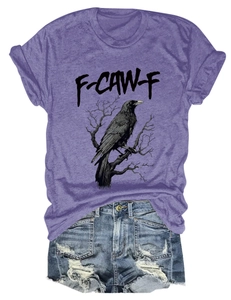 Flat lay of purple t-shirt featuring artistic crow print and F-CAW-F graphic lettering