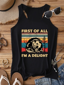 Flat lay of a black racerback tank top with retro possum print on wooden floor
