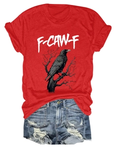 Flat lay of red cotton t-shirt with eagle print and distressed blue denim shorts