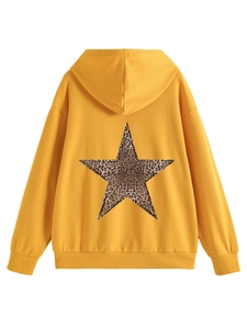 Back view of yellow oversized hoodie featuring a leopard print star patch detail