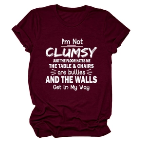 Detail of the high-quality white typography print on a burgundy casual cotton t-shirt