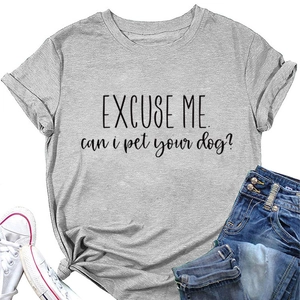Flat lay of gray crew neck tee with slogan paired with jeans and white sneakers
