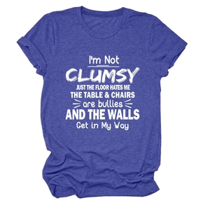 Close-up of rolled cuffs and white screen-printed slogan on royal blue cotton T-shirt