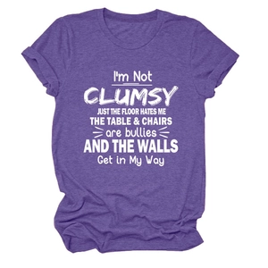 Close-up of white graphic text on heather purple cotton blend crew neck t-shirt fabric