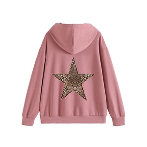 Pink oversized hoodie featuring a large leopard print star on the back with ribbed cuffs