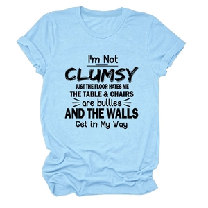 Light blue crew neck cotton T-shirt with I'm Not Clumsy slogan print in black text
