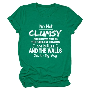 Detail of soft dark green cotton fabric and white slogan print on crew neck t-shirt