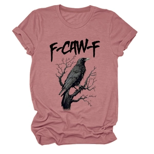 Detail of dusty rose T-shirt featuring artistic black crow and F-CAW-F graphic print