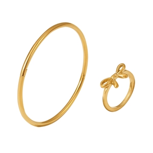 Elegante set con anello a fiocco dorato e bracciale minimalista in acciaio inossidabile