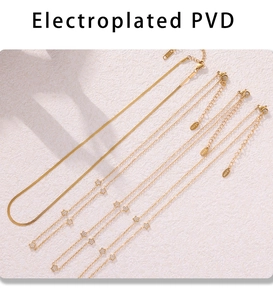 Detailed macro of 18k gold plated stainless steel necklaces with star pendants and zircon