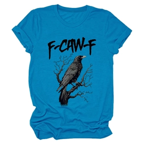 Detail of rolled cuffs and eagle print on a bright blue cotton short sleeve t-shirt