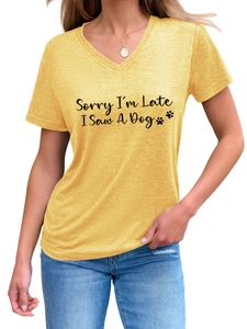 Macro detail of V-neck yellow cotton T-shirt with Sorry I'm Late I Saw A Dog print