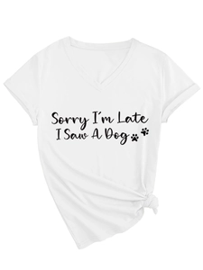 Detail of the side knot hem on this white V-neck T-shirt with funny dog lover text