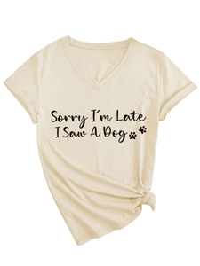 Detail of V-neck T-shirt showing Sorry I'm Late I Saw A Dog quote and tied hem design