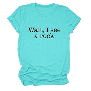 Close-up of Lake Blue cotton t-shirt featuring Wait I See A Rock quote and round neckline