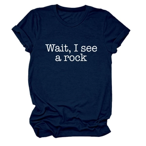 Detail of rolled cuffs and white 'Wait, I see a rock' print on navy cotton t-shirt