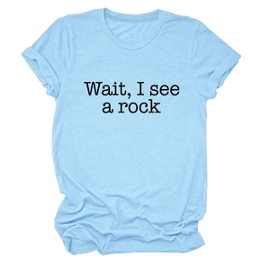 Detail of light blue cotton T-shirt featuring Wait I see a rock printed text design