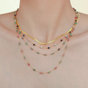 Layered gold-plated stainless steel necklace with lapis lazuli and colorful stone beads