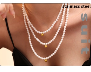 Three-layer pearl necklace with golden ball pendants made of durable stainless steel