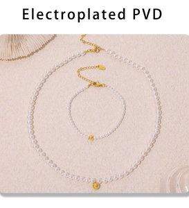 Detail view of Baroque pearl necklace set with gold PVD plated pendant on shell backdrop