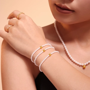Baroque pearl jewelry set with gold ball pendant including necklace, bracelet and rings