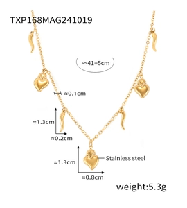Detail of 18K gold-plated stainless steel necklace with sacred heart and drop charms