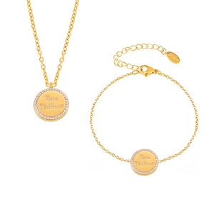 Set collana e bracciale in acciaio inossidabile dorato con cristalli e incisione fine